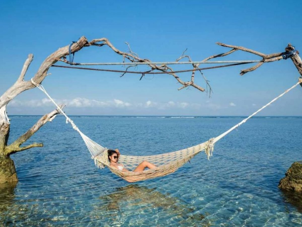Lying on Beach Hammock-Luxury Bali Travel