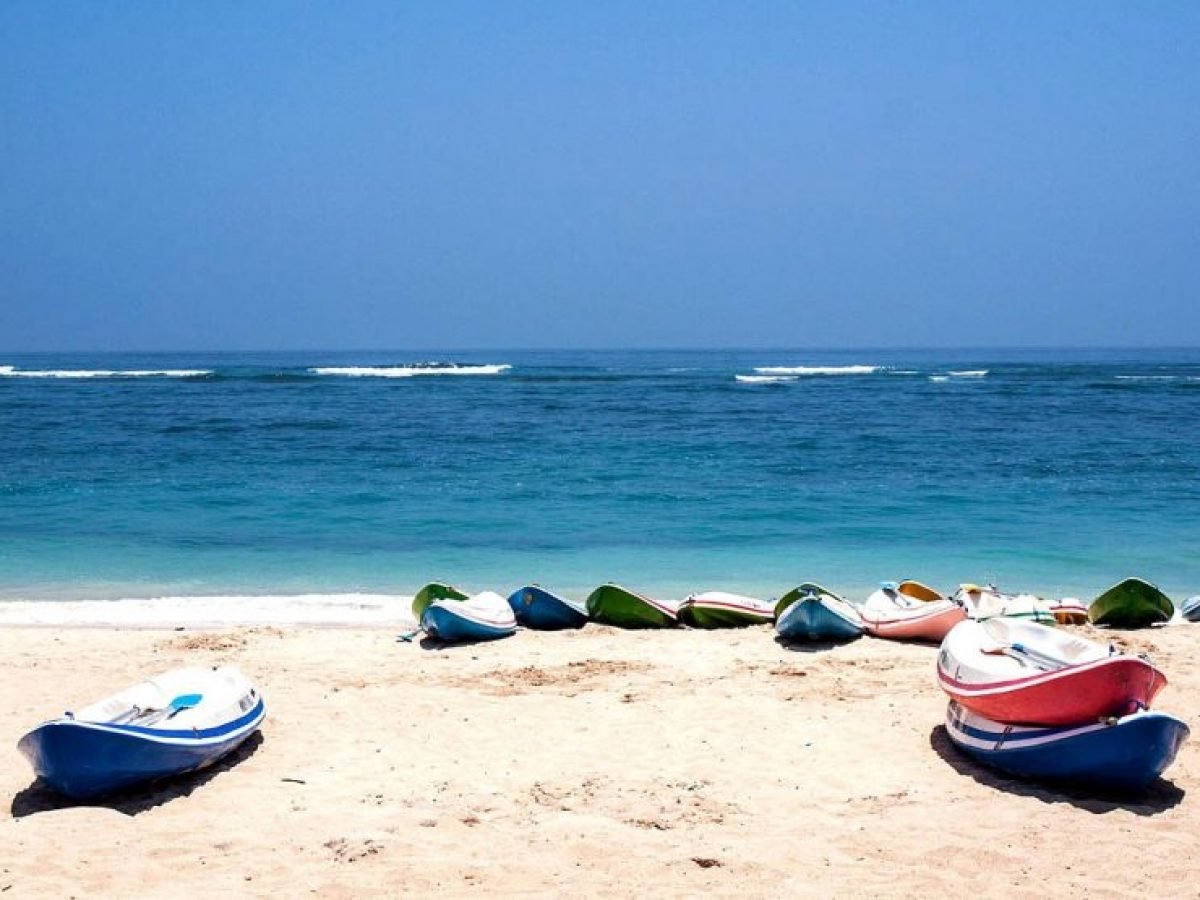Canoes at Pandawa Beach by Luxury Bali Travel